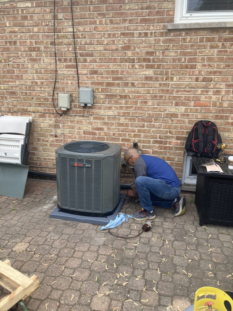 Air Conditioning Services - Installing Trane Furnace